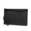 Black patterned clutch bag on a white background